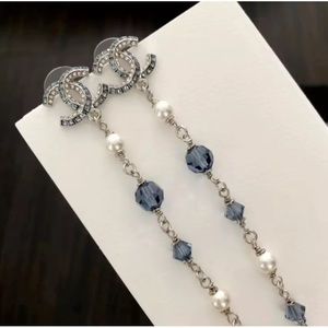 Authentic Chanel Blue Stone and Pearl Earrings
